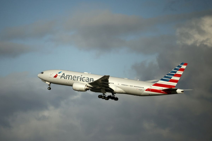 An American Airlines Boeing 777 plane takes off from Paris Charles de Gaulle airport in Roissy-en-France near Paris, France, December 2, 2021. 