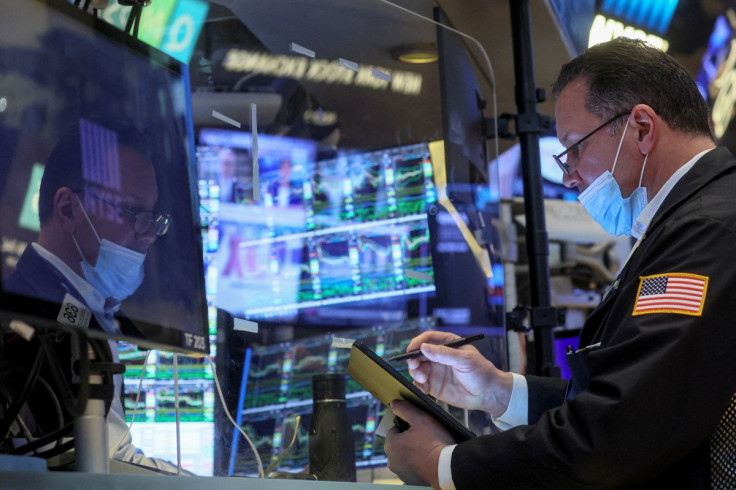 A trader works on the floor of the New York Stock Exchange (NYSE) in New York City, U.S., February 18, 2022.  