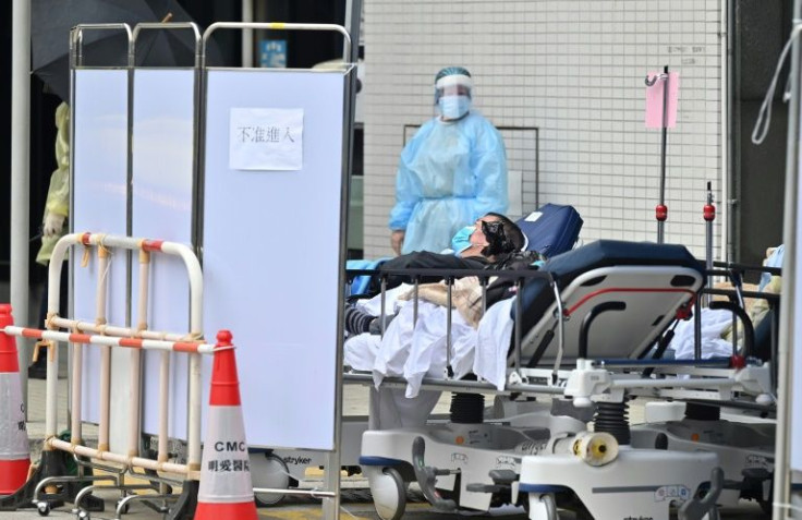 Hong Kong's hospitals have been placing elderly patients on gurneys outdoors under dropping temperatures, as they run out of isolation space
