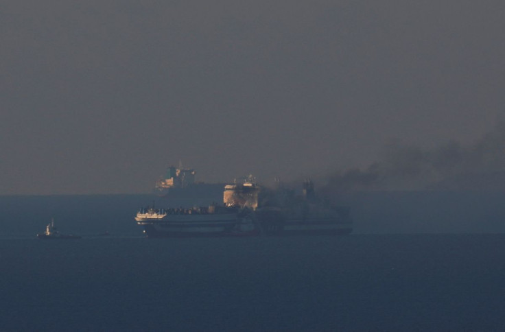Smoke on the Italian-flagged Euroferry Olympia, which sailed from Greece to Italy early on Friday and caught fire, is seen from Himara, Albania, February 19, 2022.