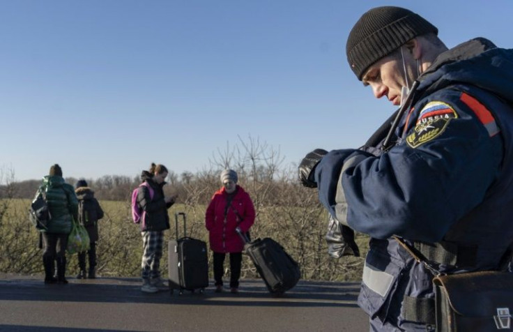 Residents of rebel regions in Ukraine have been crossing into Russia after evacuation orders