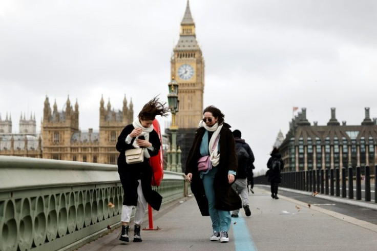London's rush-hour streets were virtually deserted as many heeded government advice to stay at home