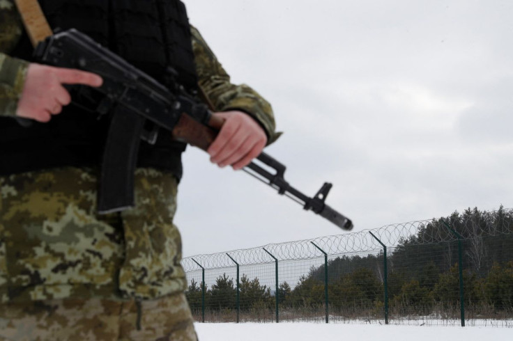 A member of the Ukrainian State Border Guard Service patrols the area near the frontier with Russia in the Chernihiv region, Ukraine February 16, 2022. 