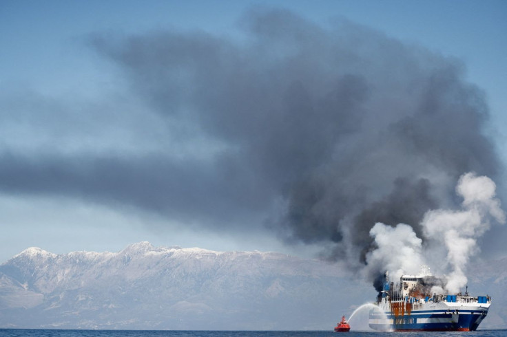 Smoke rises from the Italian-flagged Euroferry Olympia, which sailed from Greece to Italy early on Friday and caught fire, off the coast of Corfu, Greece, February 19, 2022. 