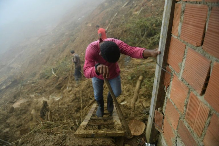 People search for victims on February 19, 2022, four days after a deadly landslide in Petropolis, Brazil