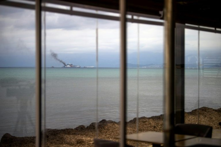 The stricken vessel lay just off the northern part of Corfu on Sunday