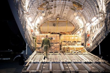 Canada's military aid is unloaded from a C17 Globemaster III plane at the International Airport outside Lviv, in this handout picture released February 20, 2022. Press service of the Ukrainian Armed Forces General Staff/Handout via REUTERS 