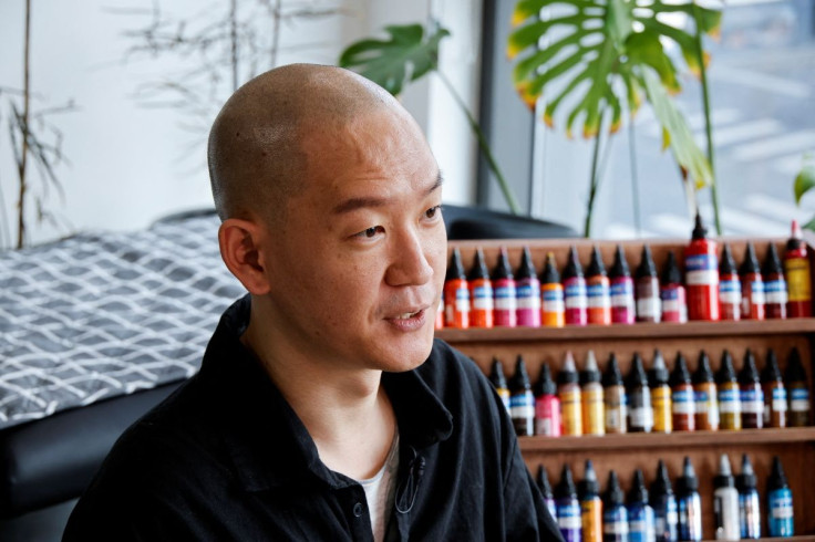 Tattooist Kim Do-yoon speaks during an interview with Reuters at a his tattoo studio in Seoul, South Korea, February 15, 2022. Picture taken February 15, 2022. 
