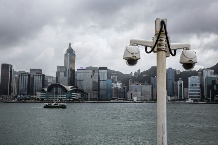 Activists in Hong Kong say they are being subjected to covert meetings, whispered threats, and mysterious phone calls as Beijing cracks down