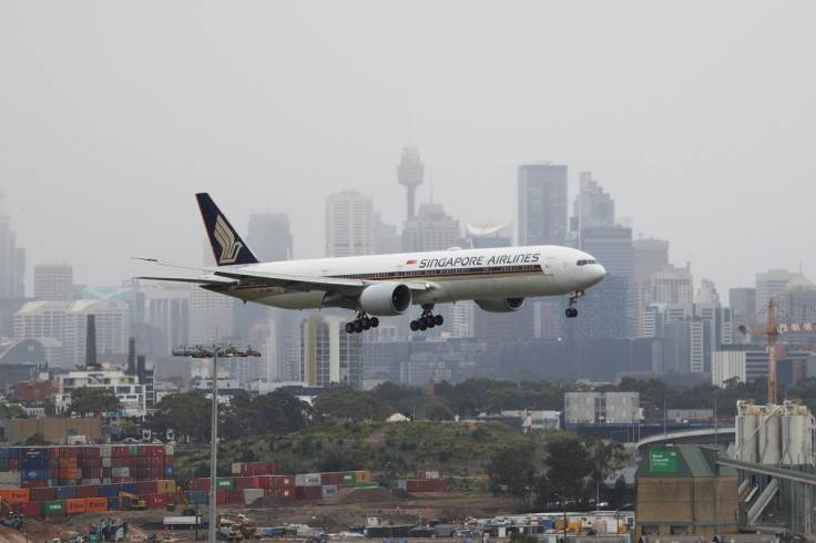 A Singapore Airlines plane arriving from Singapore lands at the international terminal at Sydney Airport, as countries react to the new coronavirus Omicron variant amid the coronavirus disease (COVID-19) pandemic, in Sydney, Australia, November 30, 2021. 