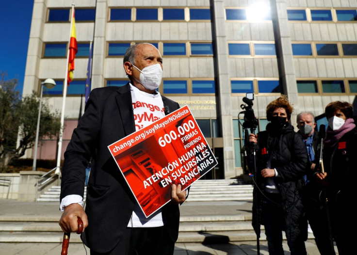 Retiree Carlos San Juan, creator of the "SoyMayorNoIdiota" ("I'm old, not an idiot") campaign, is photographed after registering 600,000 signatures against elderly exclusion by banks, at the Ministry of Economy, in Madrid, Spain, February 8, 2022.
