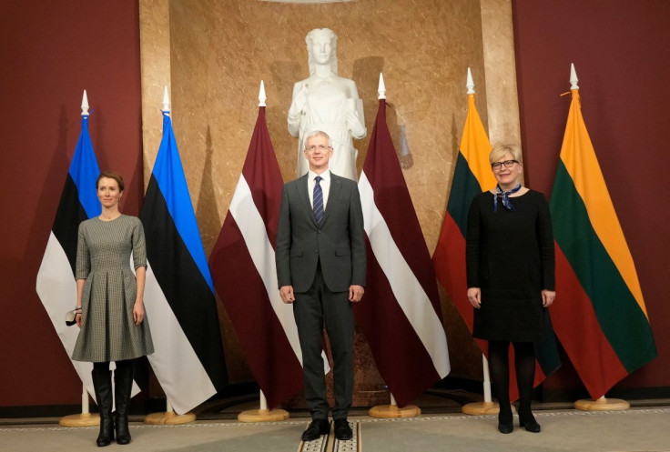 Estonian Prime Minister Kaja Kallas, Latvian Prime Minister Krisjanis Karins and Lihuanian Prime Minister Ingrida Simonyte pose for media in Riga, Latvia February 4, 2022.