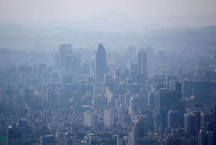 The skyline of central Seoul is seen during a foggy day in Seoul March 4, 2015.