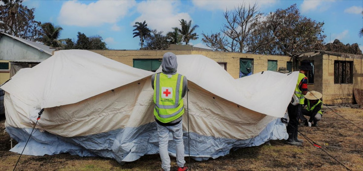 Members of Tonga's Red Cross society set up a temporary tent in Nukuâalofa, Tonga, January 23, 2022. Tonga Red Cross Society/Handout via REUTERS