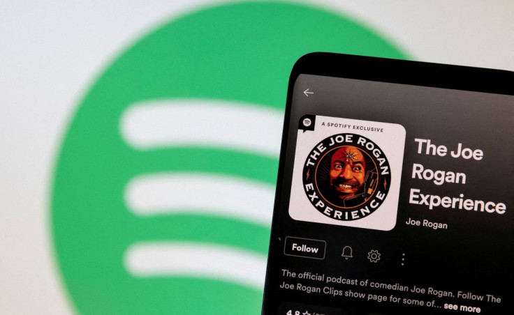 Joe Rogan's Spotify profile is seen in front of displayed Spotify logo in this photo illustration taken, February 7, 2022.