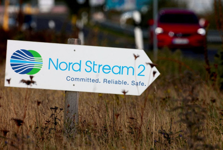 A road sign directs traffic towards the Nord Stream 2 gas line landfall facility entrance in Lubmin, Germany, September 10, 2020. 