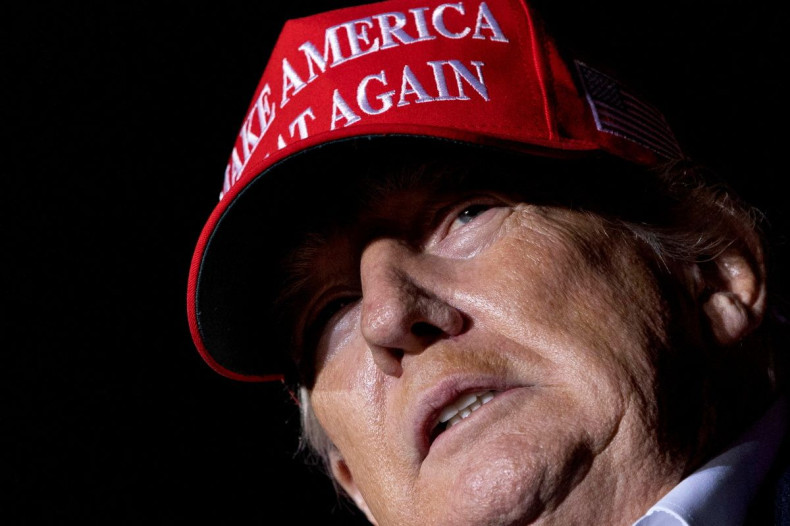 Former U.S. President Donald Trump looks on as he holds a rally in Florence, Arizona, U.S., January 15, 2022.  