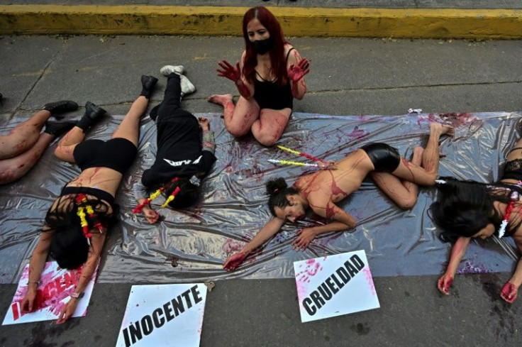Anti-bullfighting activists demonstrate outside the Plaza Mexico bullring in Mexico City