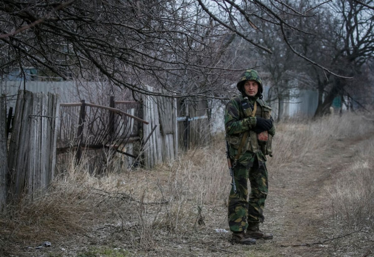 A Ukrainian service member stands on the front line near the city of Novoluhanske in the Donetsk region, Ukraine February 22, 2022.