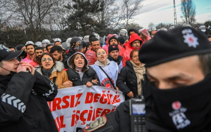 Employees of supermarket chain Migros protest after they were fired for demanding more pay -- they were soon rehired and given a raise