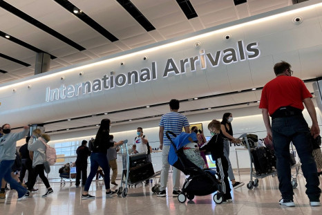  Passengers from international flights arrive at Heathrow Airport, following the outbreak of the coronavirus disease (COVID-19), London, Britain, July 29, 2020. 
