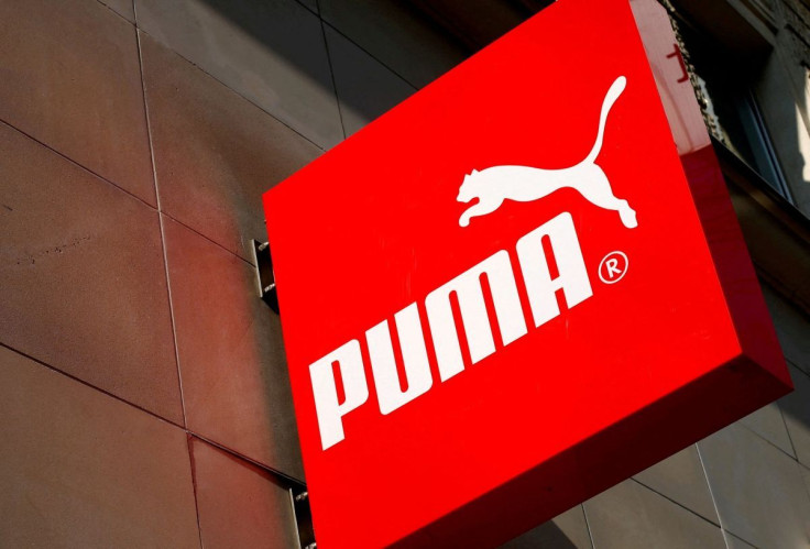 The logo of German sports goods firm Puma is seen at the entrance of one of its stores in Vienna, Austria, March 18, 2016.   