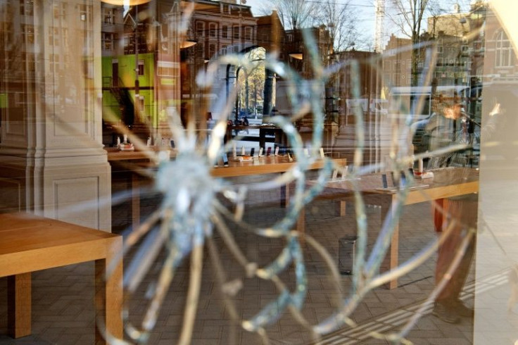 The store was to remain closed Wednesday and Thursday after the drama which left bullet holes in the window and facade