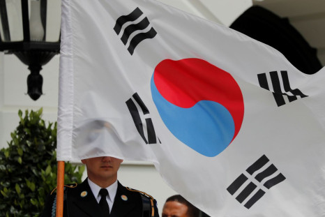 A South Korean flag covers a ceremonial guard member prior to the arrival of South Koreaâs President Moon Jae-in at the White House in Washington, U.S., April 11, 2019. 