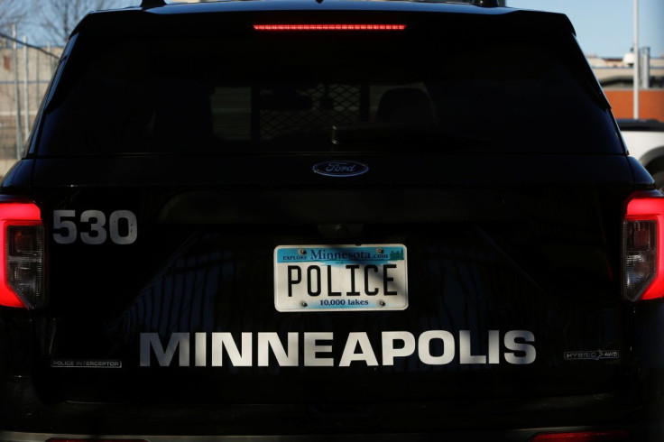 A police vehicle is seen as the Minneapolis Police Departmentâs fifth precinct remains fenced and barricaded as voters decide whether to abolish the police department and replace it with a new department of public safety in the wake of George Floyd's mu