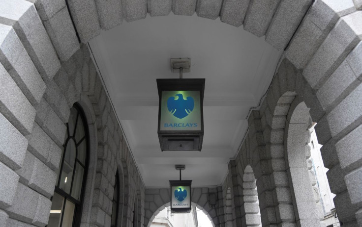 The logo of Barclays bank is seen on glass lamps outside of a branch of the bank in the City of London financial district in London September 4, 2017.