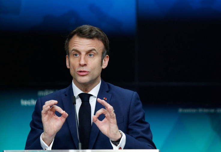 French President Emmanuel Macron gives a statement on the coronavirus disease (COVID-19) vaccination, during a European Union - African Union summit, in Brussels, Belgium February 18, 2022. 