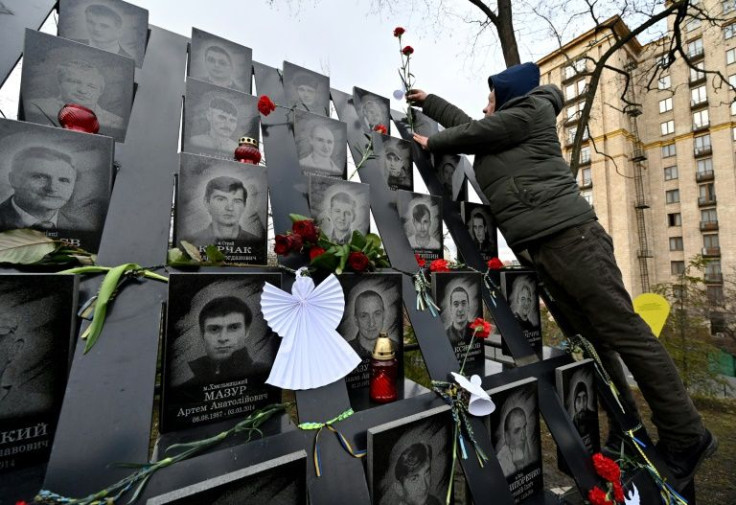 Ukrainians still pay homage to those who died near Kyiv's Maidan Square during a 2014 pro-EU revolution, which infuriated the Kremlin