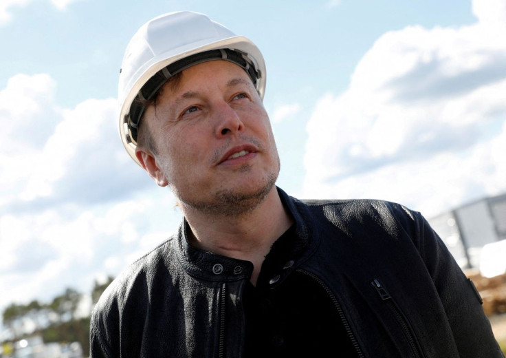 SpaceX founder and Tesla CEO Elon Musk looks on as he visits the construction site of Tesla's gigafactory in Gruenheide, near Berlin, Germany, May 17, 2021. 