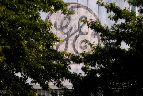 A painted  logo sits over the entrance to a General Electric Co. facility in Medford, Massachusetts July 17, 2009.   
