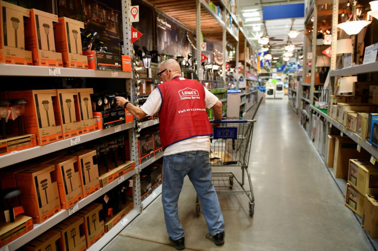 FILE PHOTO - An employee restocks items at a Lowe's home improvement chain in Austin, Texas, U.S., February 27, 2017. Picture taken February 27, 2017.