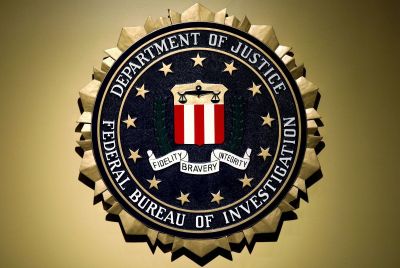 The Federal Bureau of Investigation seal is seen at FBI headquarters before a news conference by FBI Director Christopher Wray on the U.S Justice Department's inspector general's report regarding the actions of the Federal Bureau of Investigation and the