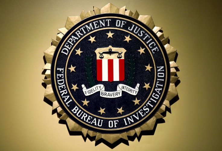 The Federal Bureau of Investigation seal is seen at FBI headquarters before a news conference by FBI Director Christopher Wray on the U.S Justice Department's inspector general's report regarding the actions of the Federal Bureau of Investigation and the 