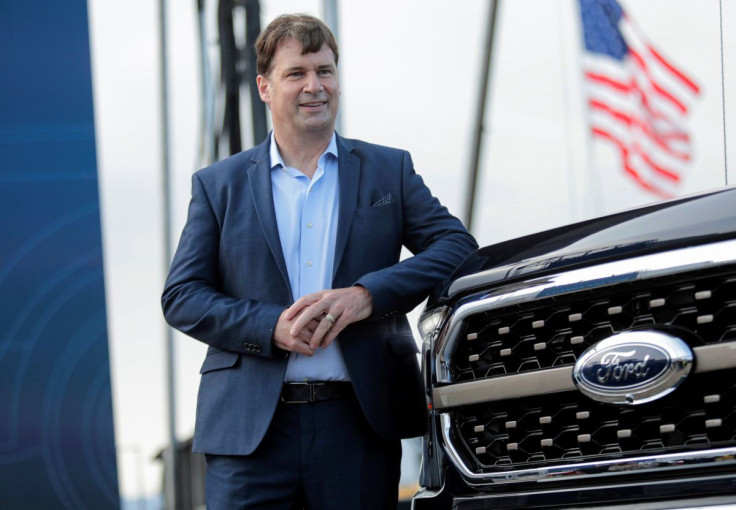 Ford Motor Co. CEO Jim Farley poses next to a new 2021 Ford F-150 pickup truck at the Rouge Complex in Dearborn, Michigan, U.S. September 17, 2020. 