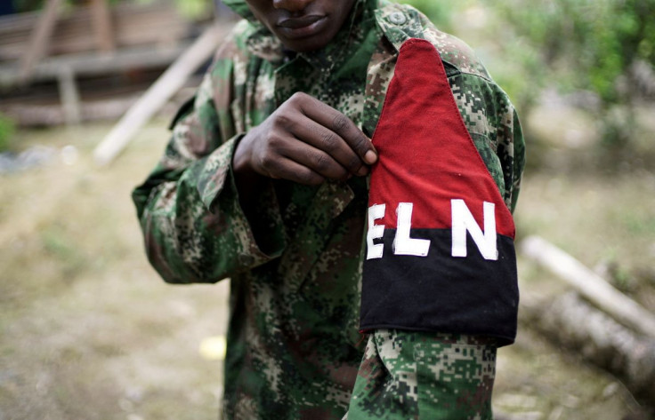 A rebel of Colombia's Marxist National Liberation Army (ELN) shows his armband while posing for a photograph, in the northwestern jungles, Colombia August 31, 2017.