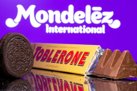 Oreo biscuits and a Toblerone Swiss milk chocolate are seen displayed in front of Mondelez International logo in this illustration picture taken July 26, 2021. 