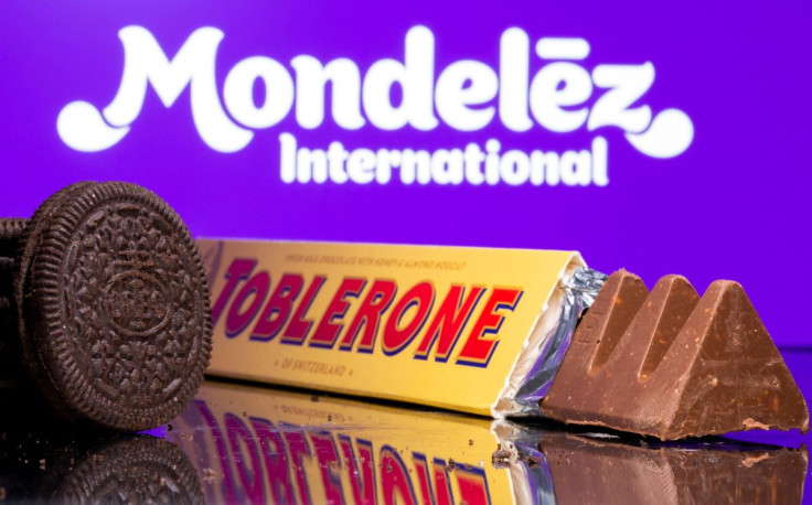 Oreo biscuits and a Toblerone Swiss milk chocolate are seen displayed in front of Mondelez International logo in this illustration picture taken July 26, 2021. 