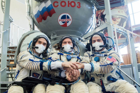 Cosmonauts of the Russian space agency Roscosmos Pyotr Dubrov, Oleg Novitskiy and NASA astronaut Mark Vande Hei pose for a picture during a training session ahead of their expedition to the International Space Station (ISS) in Star City, Russia March 20, 