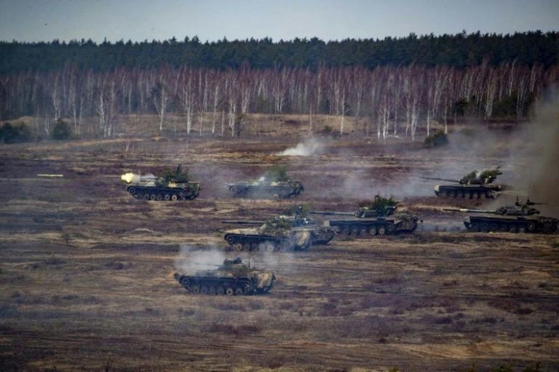 This handout photo from the Russian Defence Ministry on February 21, 2022, shows Russian and Belarus tanks during joint exercises of their armed forces near Brest, Belarus