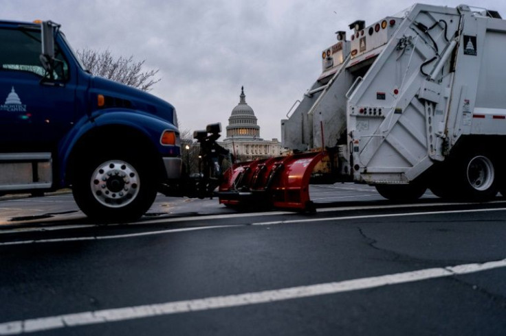 Municipal vehicles are being used to block access to sensitive sites in Washington as authorities ready for the arrival of truck convoys from across the United States