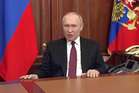 Russian President Vladimir Putin speaks about authorising a special military operation in Ukraine's Donbass region during a special televised address on Russian state TV, in Moscow, Russia, February 24, 2022, in this still image taken from video.  Russian