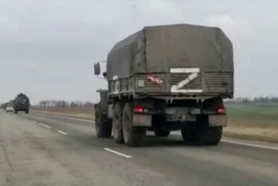 Military trucks, with letter 'Z' on them, drive near Armyansk, in Crimea, February 24, 2022 in this screen grab taken from a video. REUTERS TV/via REUTERS