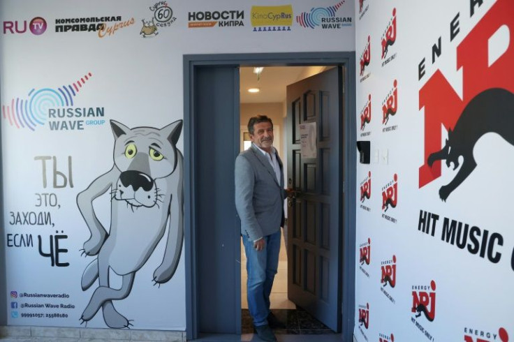 Evgeny Staroselskiy, a director of Russian Radio Cyprus, poses for a picture at the station