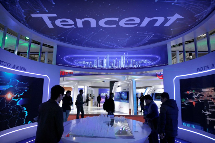 People visit Tencent's booth at the World 5G Exhibition in Beijing, China November 22, 2019.