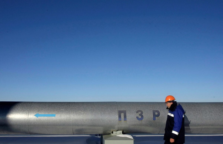 An employee walks at Russian gas export monopoly Gazprom's Sudzha pumping station, January 13, 2009. Little or no Russian gas is flowing to the European Union via Ukraine despite an agreement by Russia to resume supplies on Tuesday, the European Commissio