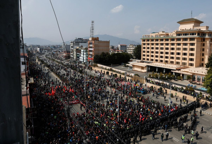 Demonstrators gather as they try to break through the barricades during a protest against the $500 million U.S. infrastructure grant under the Millennium Challenge Corporation (MCC) near the parliament in Kathmandu, Nepal, February 24, 2022. 
